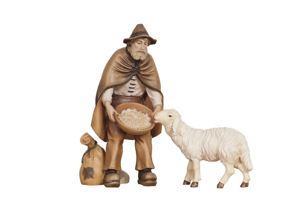 Kostner Nativity Scene Shepherd Feeding Grain with Sheep